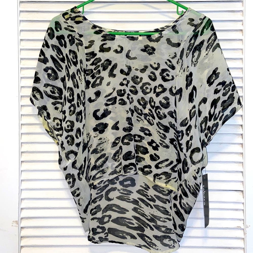 Hi/low Leopard pattern blouse with black and yellow detail.